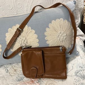 All genuine leather Tignanello crossbody purse.